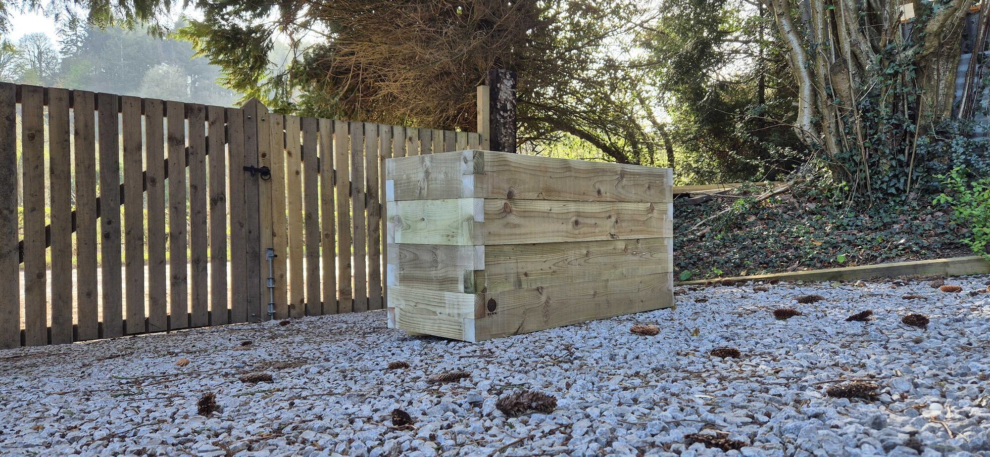 Gwern wooden planter, low-angle view of stacked structural timber courses